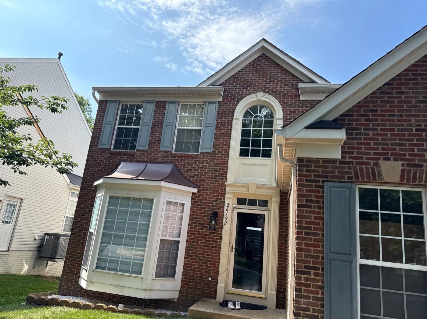 Front of the home before the bay window rebuild